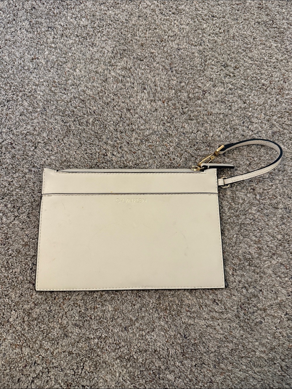 Calvin Klein Ivory Wristlet with Gold Hardware